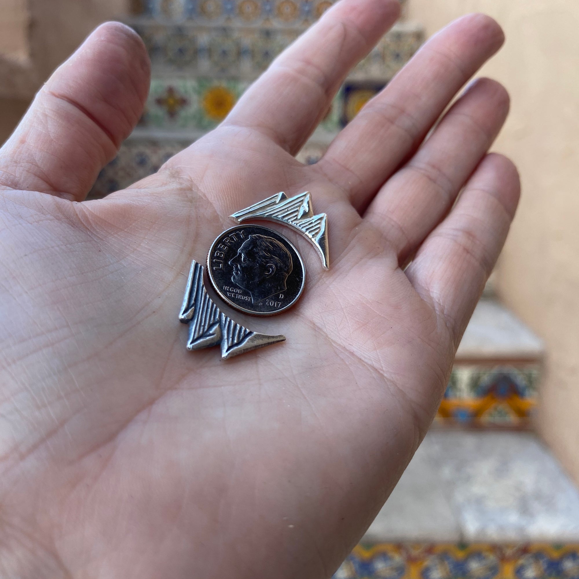 sterling silver mountain casting with dime for size reference 