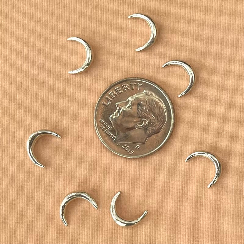 silver crescent moon casting